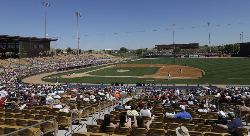 Fans at Camelback Ranch watch a spring training baseball game between the White Sox and Angels in 2016.