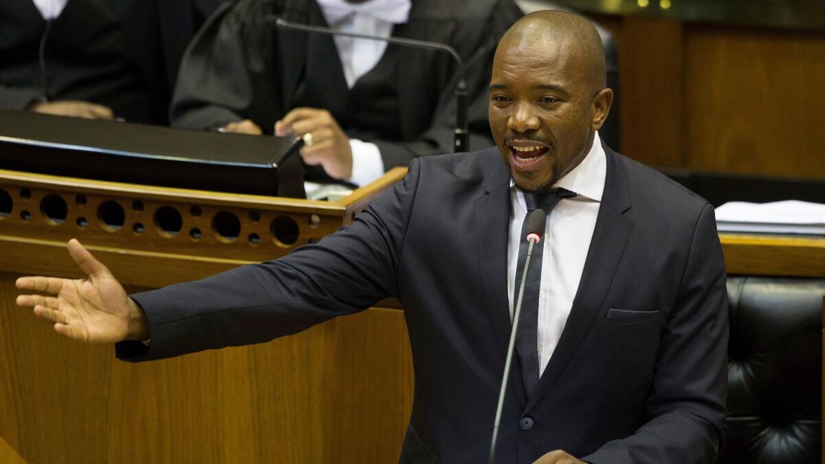 Mmusi Maimane, leader of South Africa's opposition Democratic Alliance, speaks against President Jacob Zuma in parliament in Cape Town on Nov. 10, 2016.