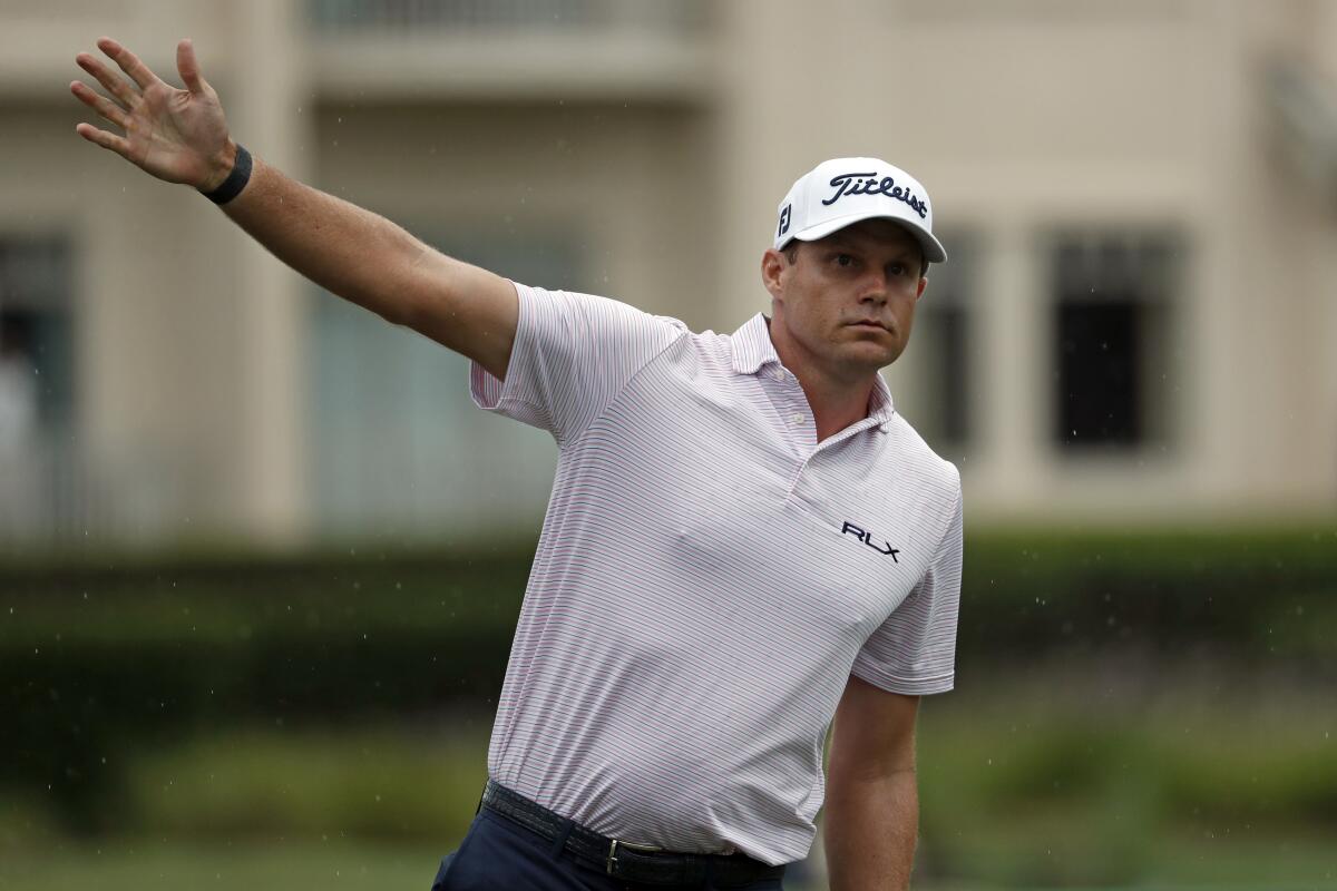 Nick Watney signals after a tee shot in the first round of the RBC Heritage golf tournament June 18, 2020.