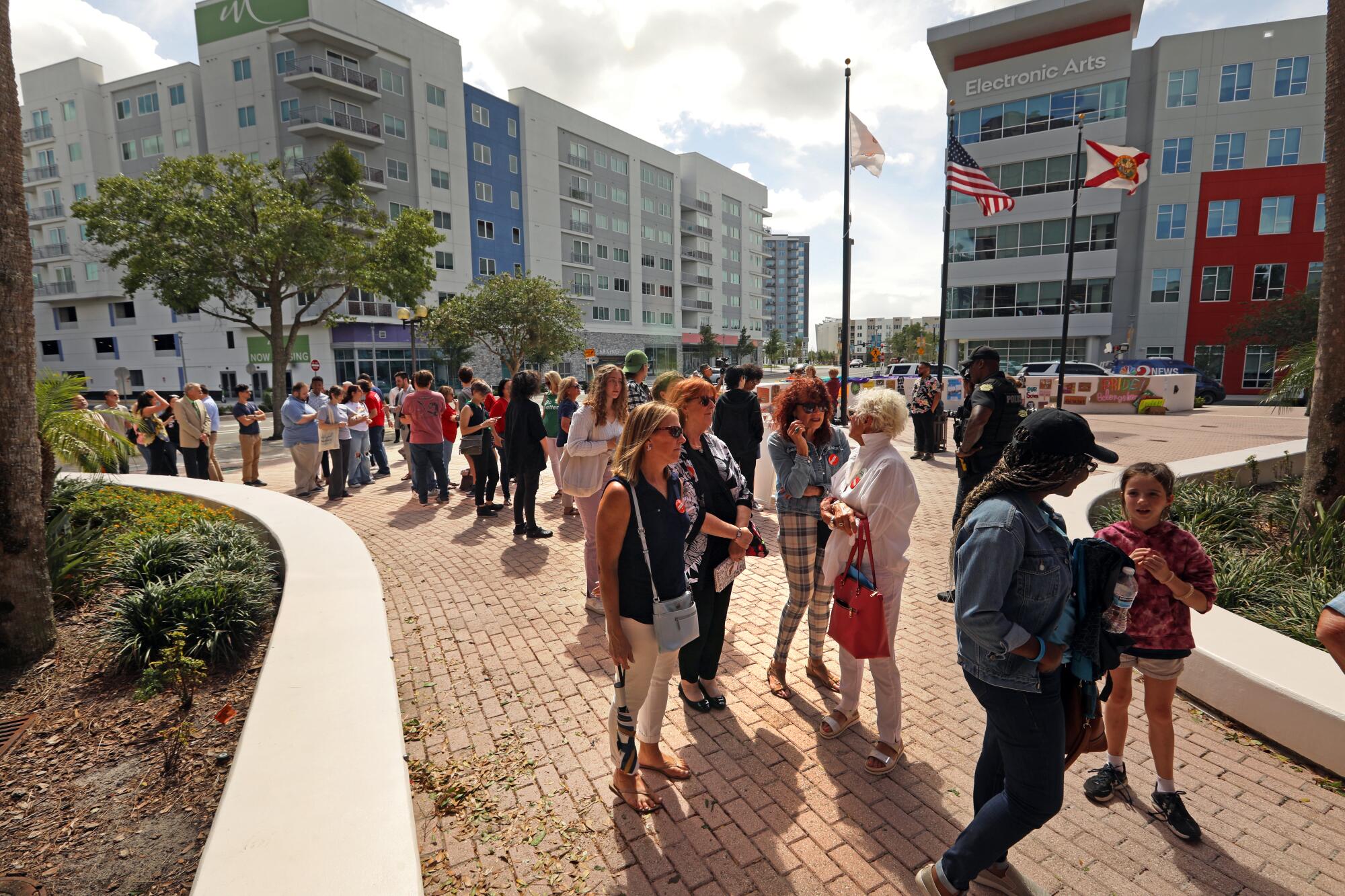 A crowd gathers to attend a school board meeting in Orlando, Florida, amid protests over book banning and LGBTQ rights.  