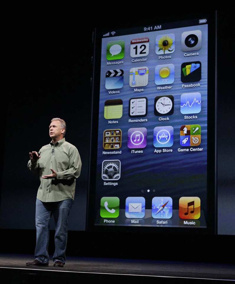Phil Schiller, Apple's senior vice president of worldwide marketing, speaks on stage during an introduction of the new iPhone 5 in San Francisco on Wednesday.