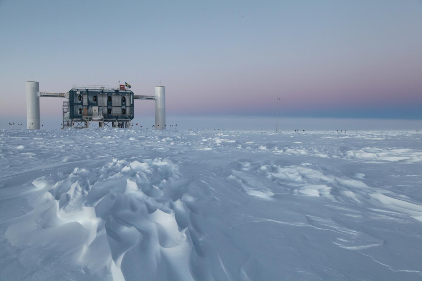 The IceCube Neutrino Observatory at the Amundsen-Scott South Pole station in Antarctica is the world's largest neutrino detector. Its computers collect raw data on neutrino activity from sensors in the ice that look for light emitted when neutrinos strike.