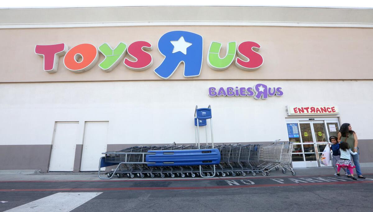 Shoppers visit the Toys R Us in Burbank on Monday, March 19, 2018. The chain has declared bankruptcy and will shuttering all of its U.S. stores.