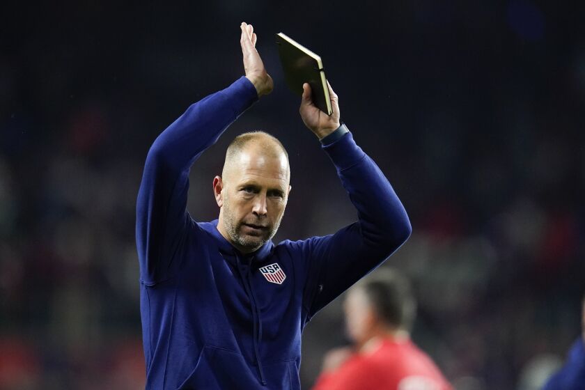 United States head coach Gregg Berhalter reacts after defeating Mexico 2-0 during a FIFA World Cup qualifying soccer match, Friday, Nov. 12, 2021, in Cincinnati. (AP Photo/Julio Cortez)