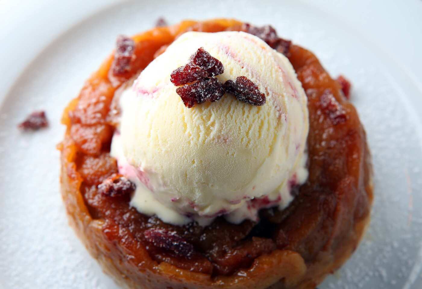 Dessert at the Water Grill in downtown Los Angeles could be the pear and dried cherry tarte tatin, topped with cherry swirl ice cream.
