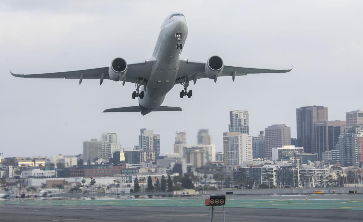 A Lufthansa plane heading to Munich, takes off on Wednesday, March 30, 2022 at San Diego International Airport. 