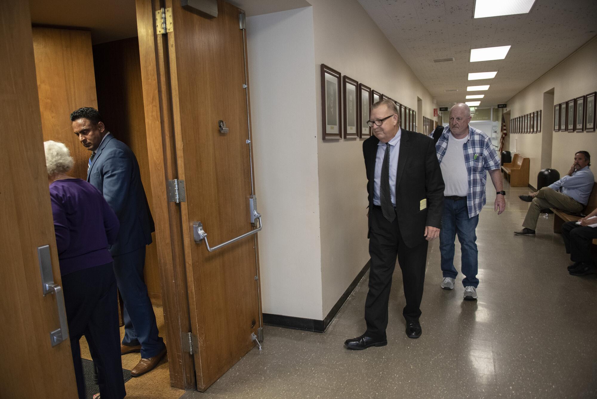 Modesto attorney Frank Carson heads into the courtroom at the Stanislaus County Courthouse.