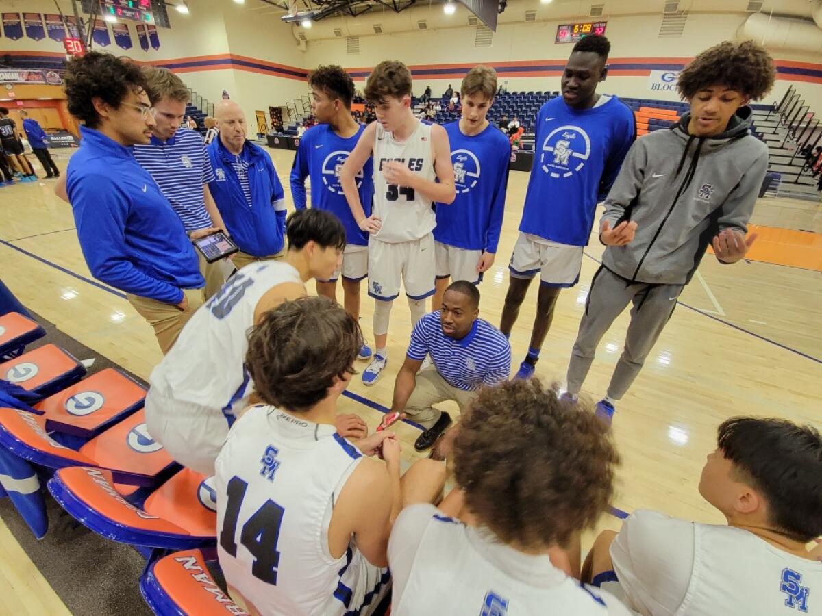 Coach Justin Bell of Santa Margarita talking to his players in Las Vegas.