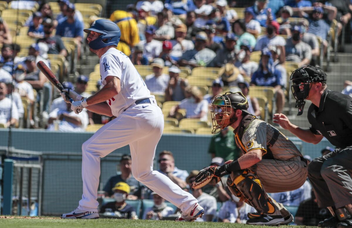 Dodgers starting pitcher Max Scherzer bats against the Padres on Sept. 12.