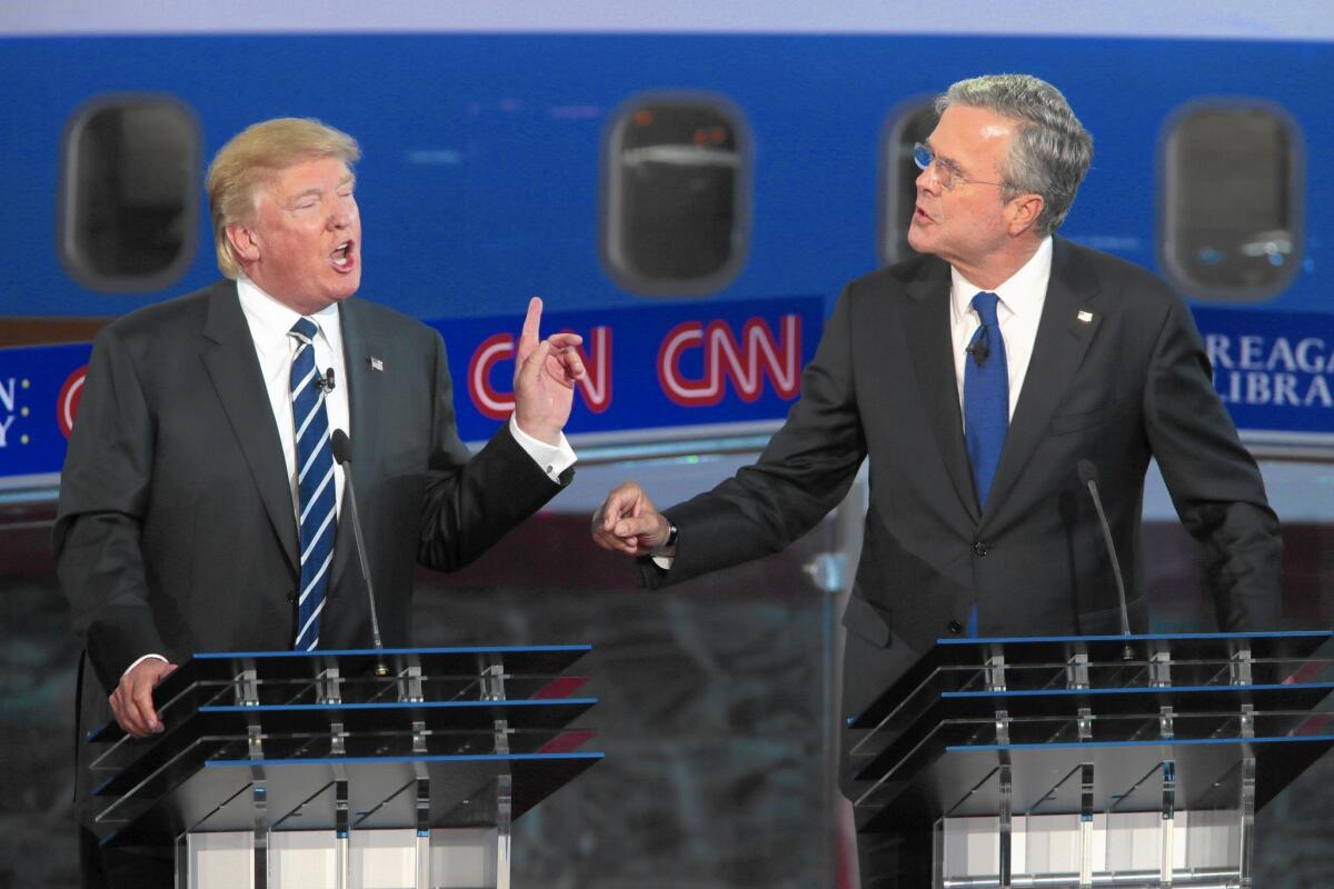 Republican presidential candidates Donald Trump and Jeb Bush spar during a debate at the Ronald Reagan Presidential Library in Simi Valley on Sept. 16. (Robert Gauthier / Los Angeles Times)