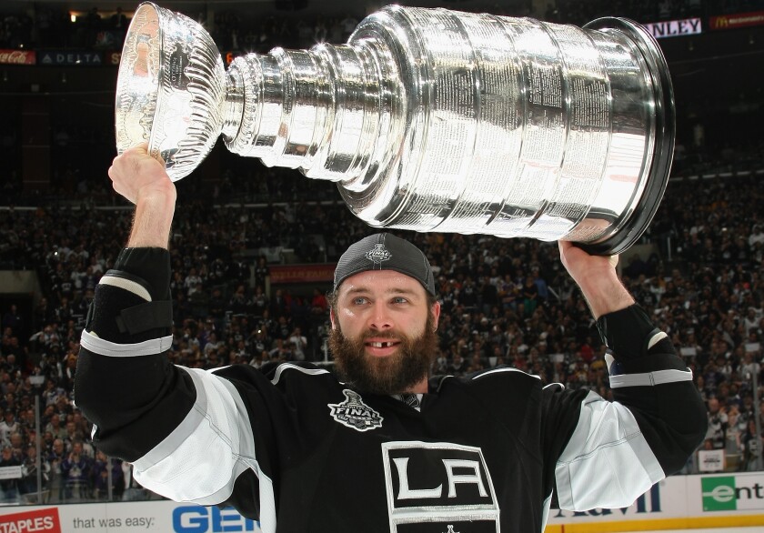 Kings forward Dustin Penner celebrates with the Stanley Cup following the team’s victory over the New Jersey Devils in 2012.