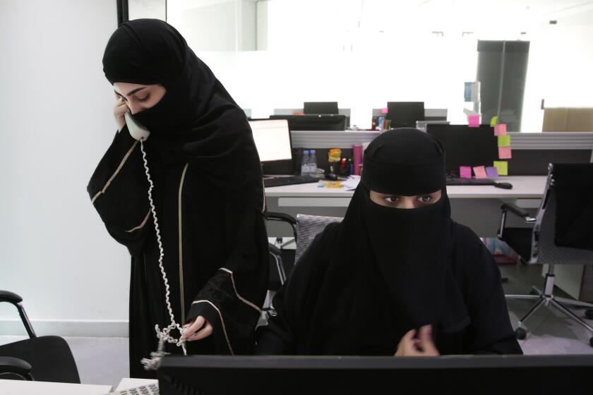 At Glowork, a work employment agency where Saudi women help other women find jobs, recruiters with the agency work the phones trying to find jobs for other women. When one is hired, they ring a bell.