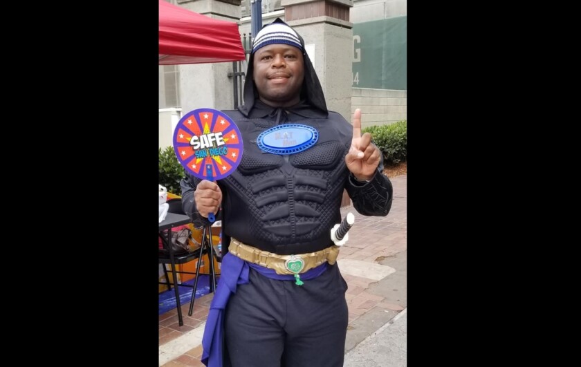 Yusef Miller, a leader in the North County Muslim community, dressed as a Muslim superhero joined other faith leaders tto educated people about human trafficking.