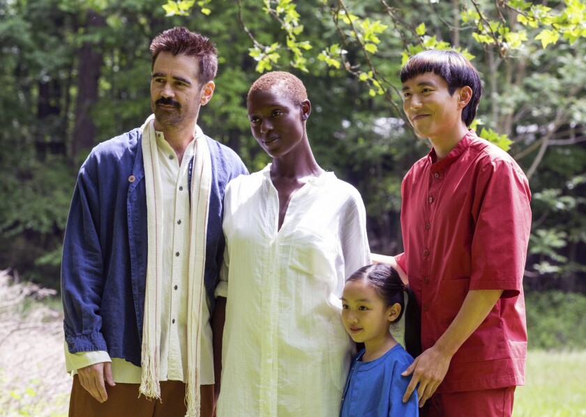 This image released by A24 shows Colin Farrell, from left, and Jodie Turner-Smith, Malea Emma Tjandrawidjaja and Justin H. Min in a scene from "After Yang." (A24 via AP)