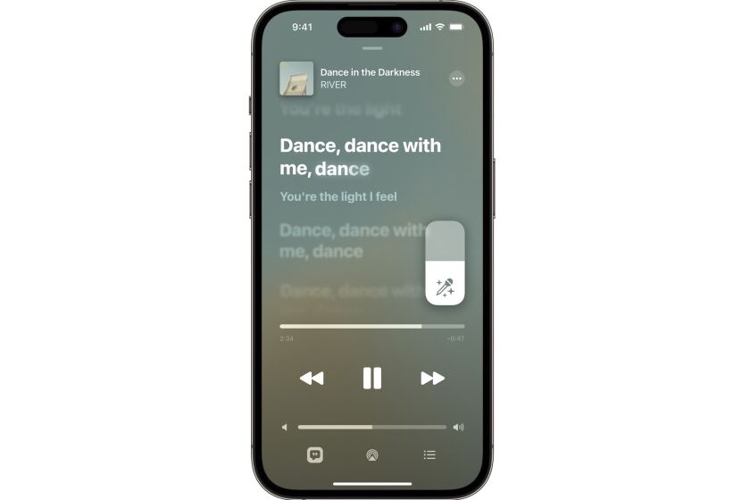 This image released by Apple Music shows Apple Music Sing, a new feature displayed an iPhone 14 Pro. The feature gives the user the ability to adjust a song's vocals and an enhanced beat-by-beat lyric display, which both also draw on the platform's massive song library. The result is what Apple hopes will be an effortless invitation to karaoke. (Apple Music via AP)