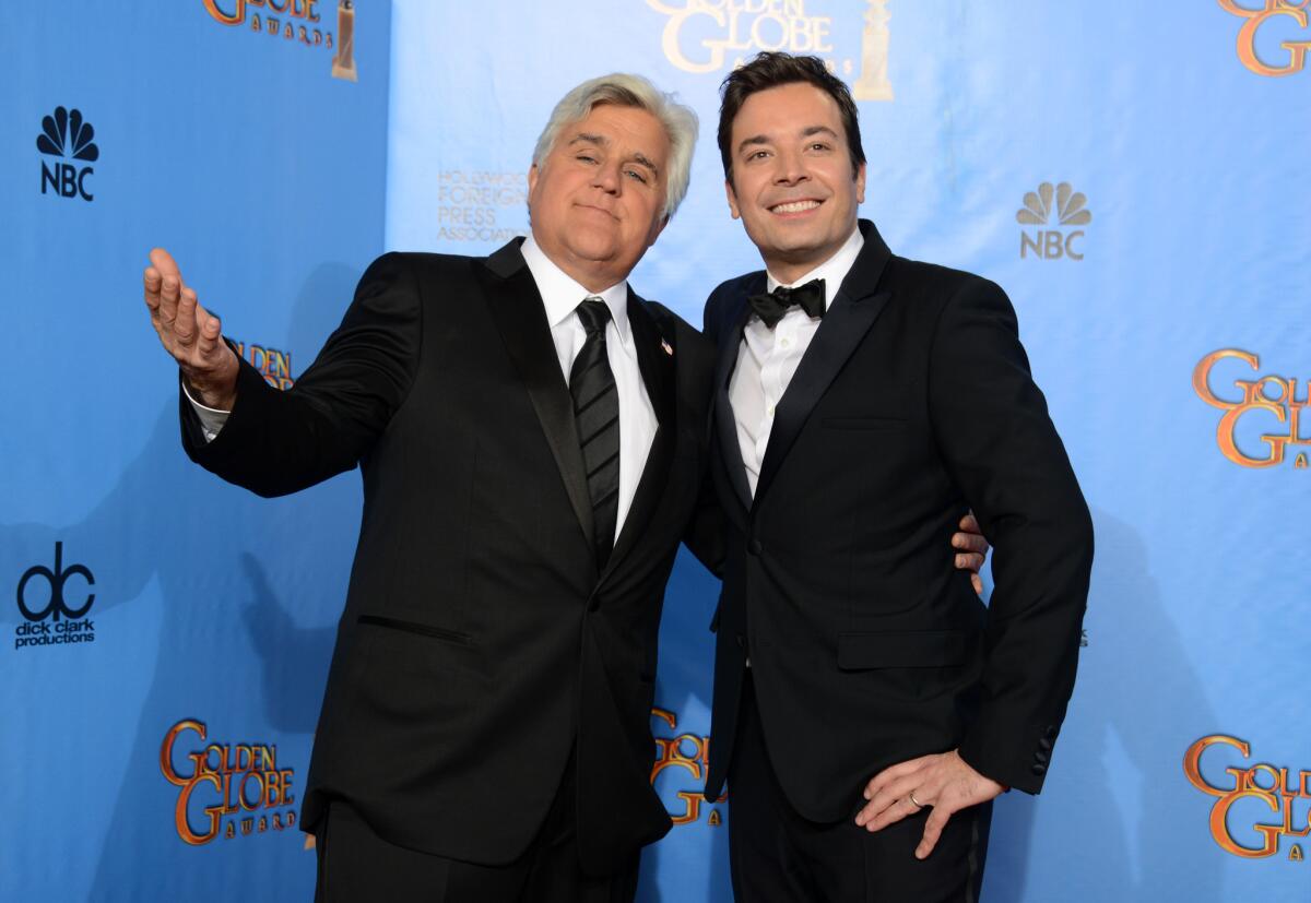 Jay Leno, left, and Jimmy Fallon backstage at the Golden Globe Awards in Beverly Hills in January. Leno will be Fallon's guest on the "Tonight Show" on Friday.