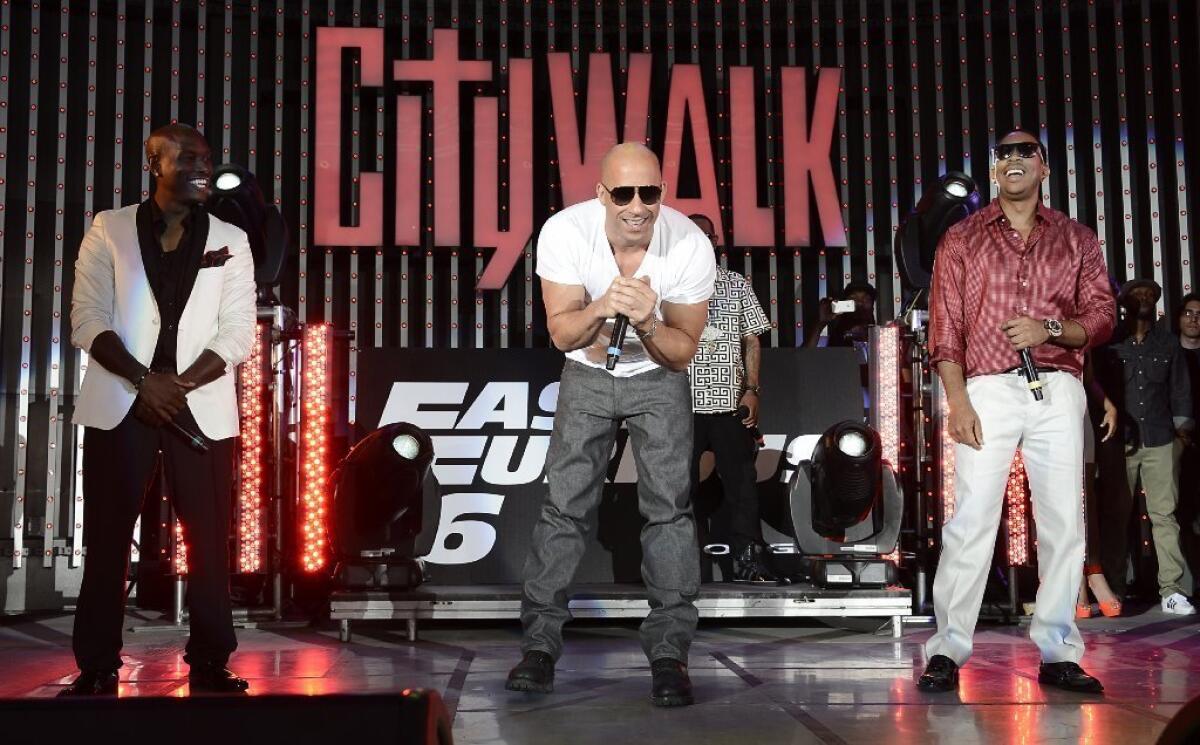 Tyrese Gibson, Vin Diesel and Ludacris perform at the U.S. premiere of "Fast & Furious 6" at the Gibson Amphitheatre.
