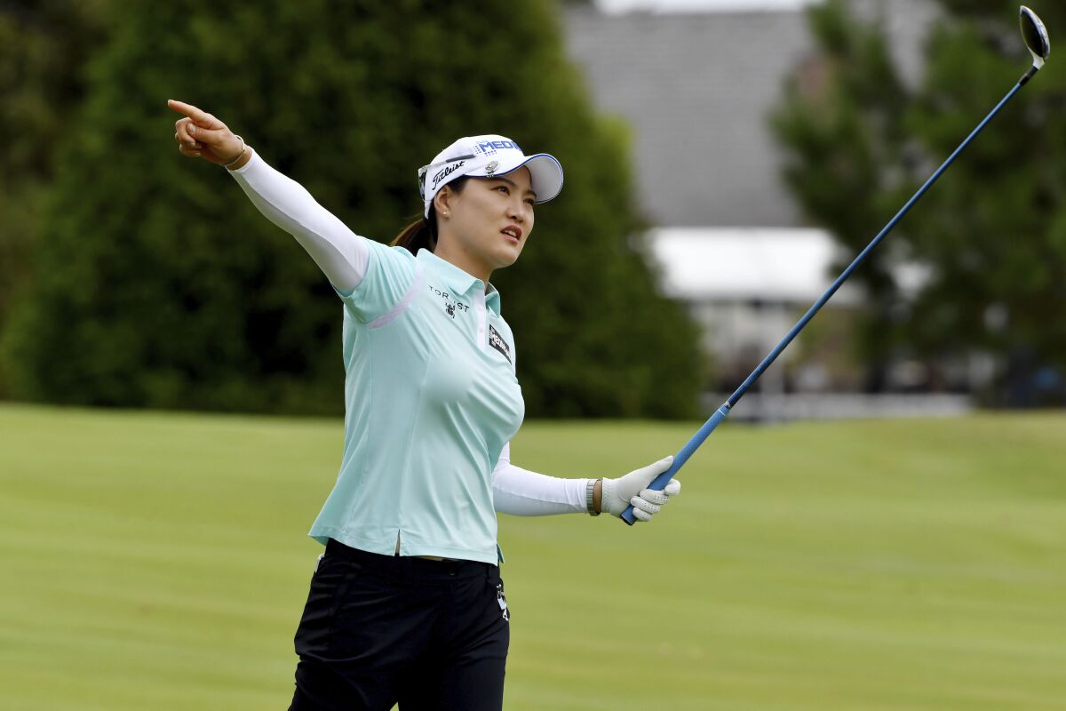 So Yeon Ryu, of South Korea, reacts to her shot on the 18th fairway during the first round of the LPGA Walmart NW Arkansas Championship golf tournament, Friday, Sept. 24, 2021, in Rogers, Ark. (AP Photo/Michael Woods)