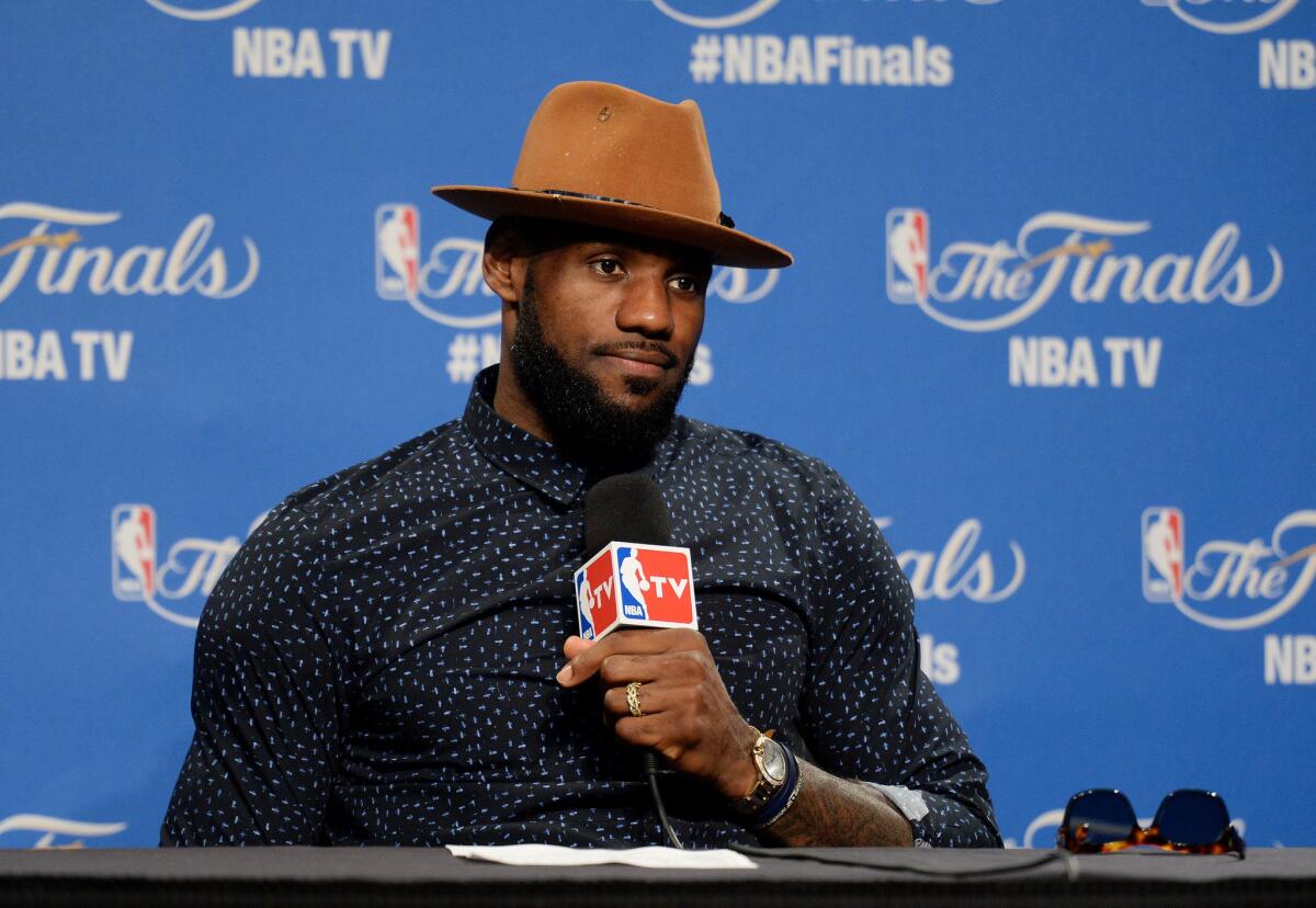Cleveland Cavaliers forward LeBron James speaks to the media after losing to the Golden State Warriors in the NBA Finals.