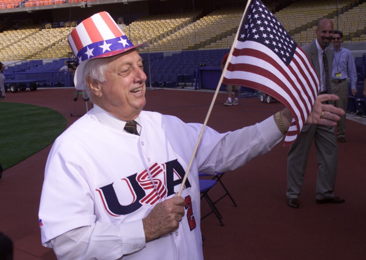 Tommy Lasorda shows his patriotic side after being named manager of the 2000 U.S. Olympic baseball team.