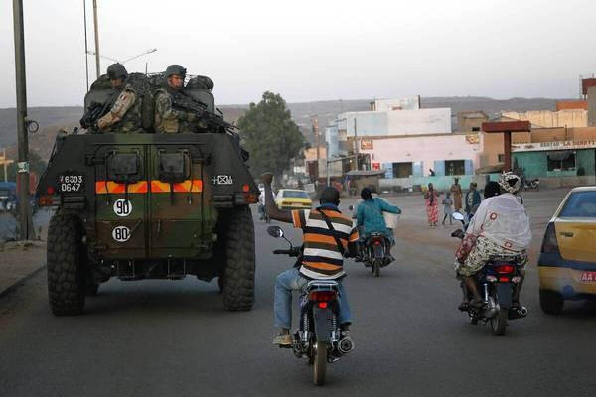 A motorcyclist shows his support to French troops in Bamako, Mali's capital.