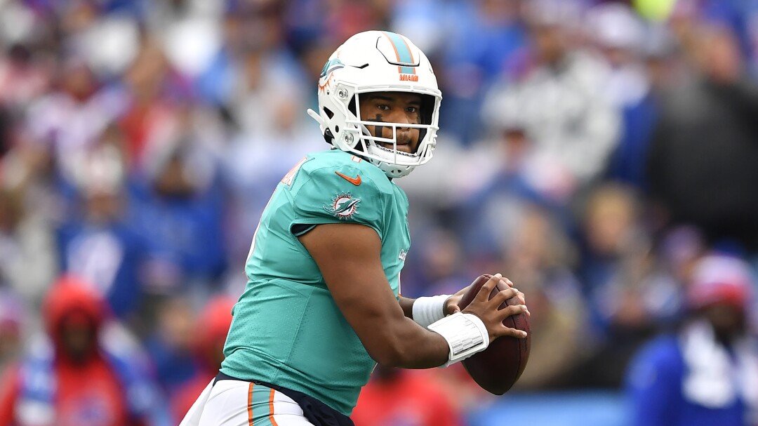 Miami Dolphins quarterback Tua Tagovailoa looks to pass.