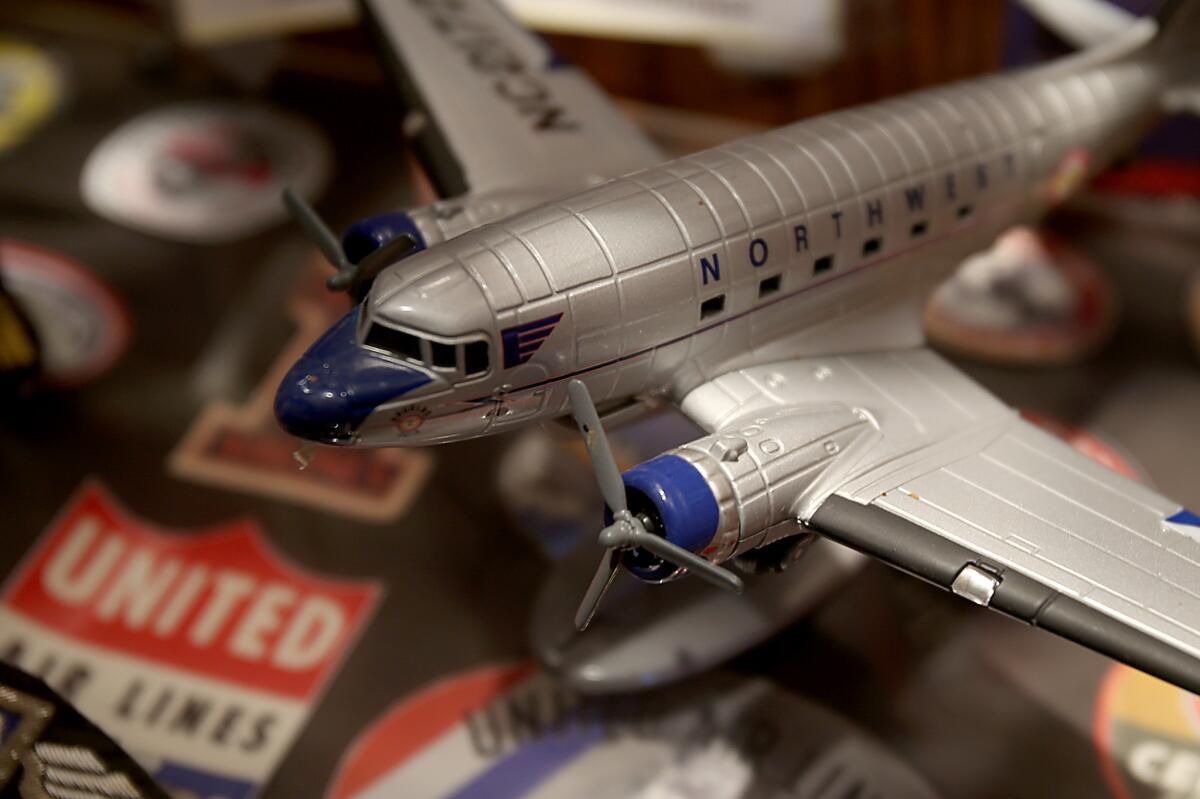 A display that commemorates the early days of commercial aviation is shown at the Proud Bird, an LAX-area hangout facing closure.