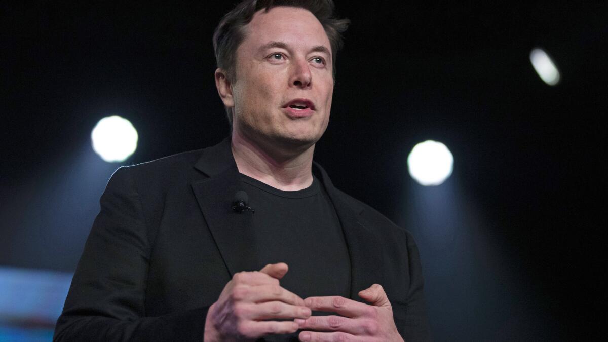 Musk sells $6.9 billion of Tesla shares after saying he was done - Los Angeles Times
