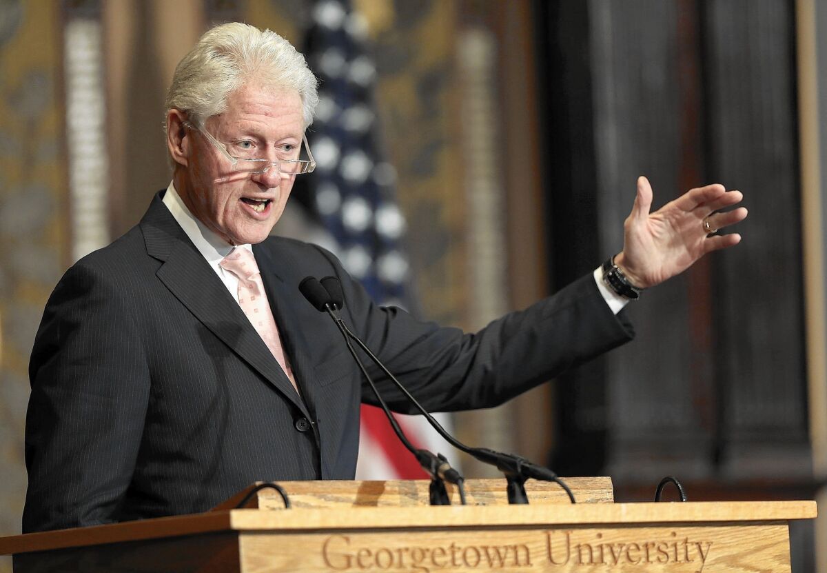 Former President Clinton speaks at Georgetown University in Washington.
