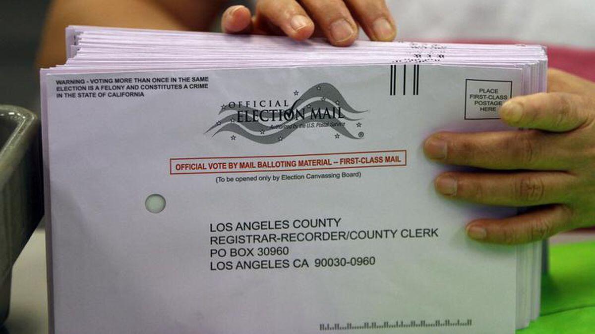 Gov. Jerry Brown signed a new law requiring counties to prepay postage for mail-in ballots.