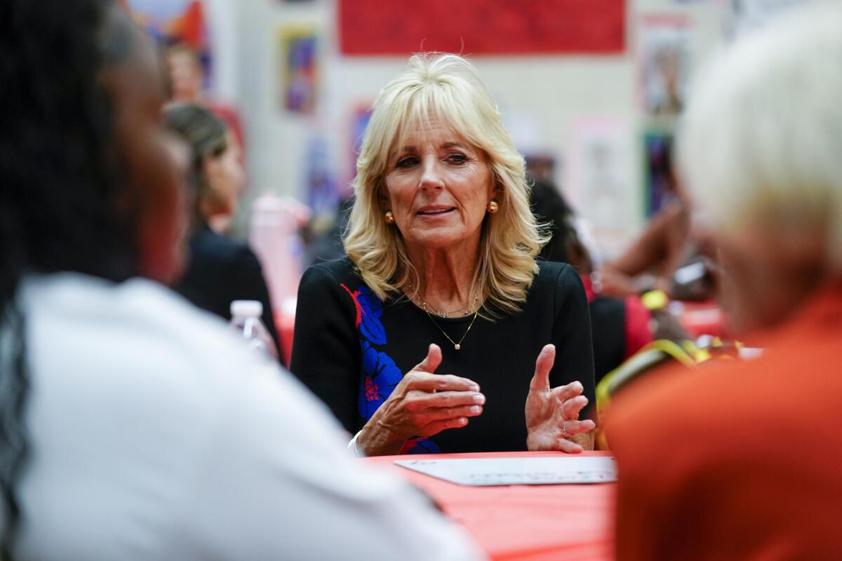 First lady Jill Biden talks to students during a stop at Westside Academy Wednesday, Oct. 12, 2022, in Milwaukee. (AP Photo/Morry Gash)