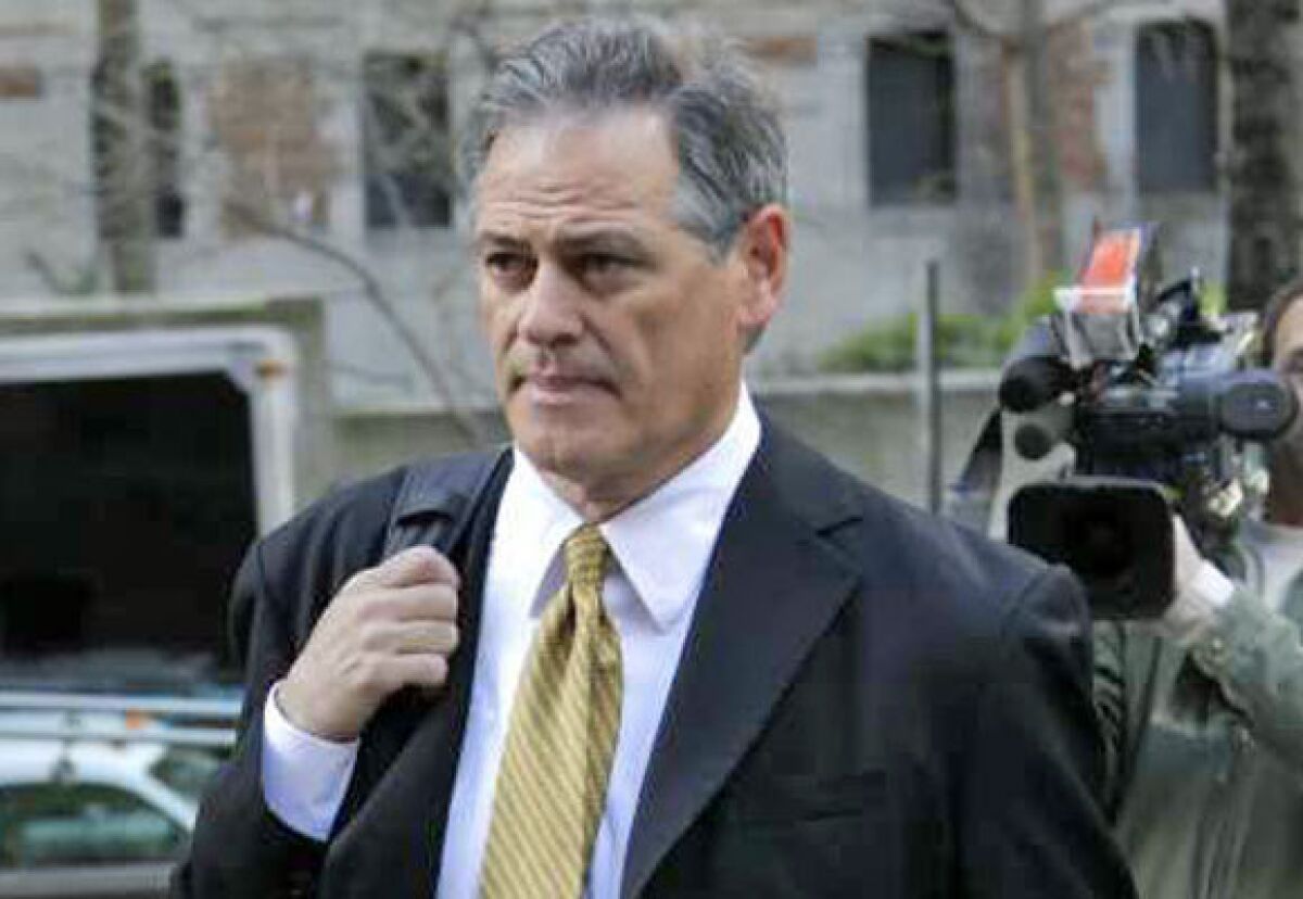 New Orleans Saints General Manager Mickey Loomis arrives for a meeting at NFL headquarters in New York on April 5.