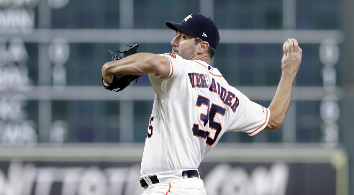 Houston Astros starting pitcher Justin Verlander delivers against the Oakland Athletics on Sept. 12.