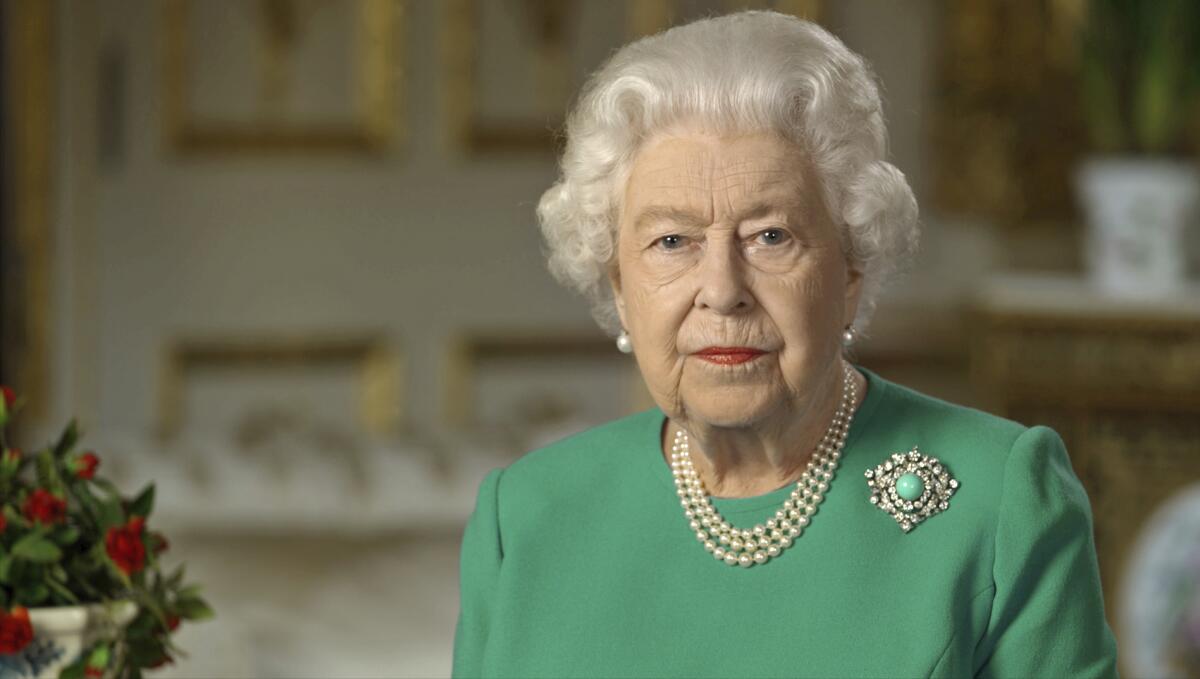 Image of Britain's Queen Elizabeth II addressing the nation and the Commonwealth from Windsor Castle.