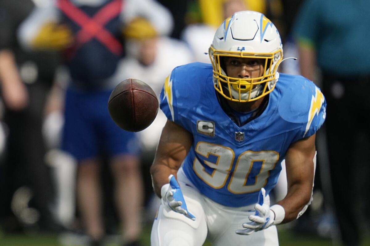 Chargers running back Austin Ekeler makes a catch in the first half against the Lions.