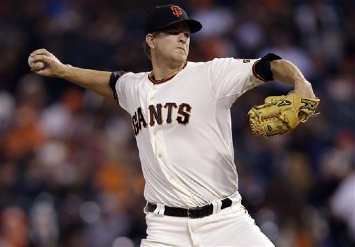 San Francisco Giants pitcher Matt Cain throws against the