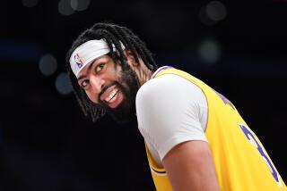 Los Angeles, California March 22, 2023-Lakers Anthony Davis smiles to the fans as his team.