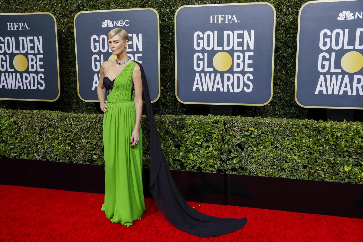 Charlize Theron arrives at the Golden Globes