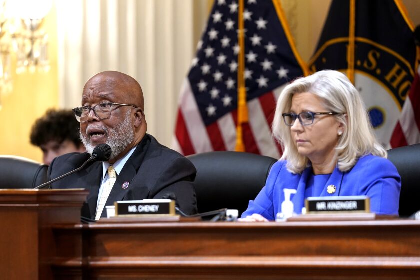 Committee chairman Rep. Bennie Thompson, D-Miss., gives opening remarks as Vice Chair Liz Cheney, R-Wyo., looks on.