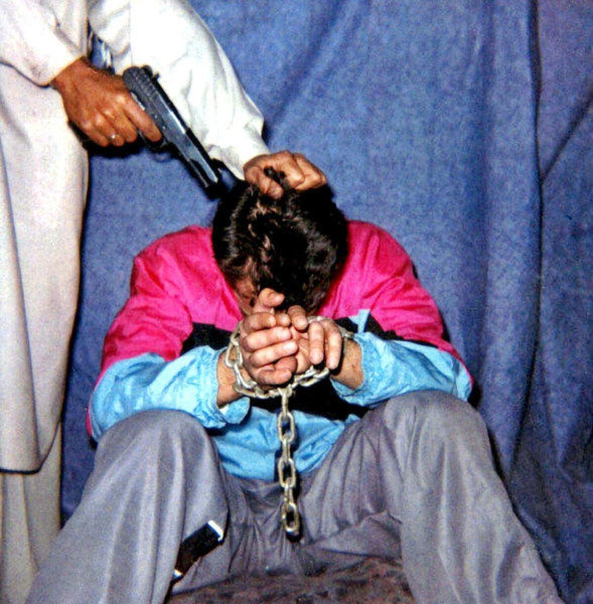 Wall Street Journal reporter Daniel Pearl is seen in this picture sent to news media organizations by his kidnappers. Pearl was abducted in Karachi, Pakistan, in January 2002 and later killed.