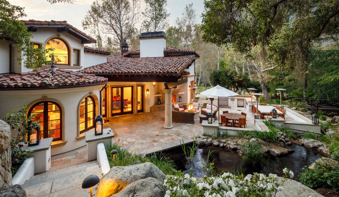 The hideaway includes a Spanish-style mansion, guesthouse, pool house, gate house and meditation house spread across five acres.