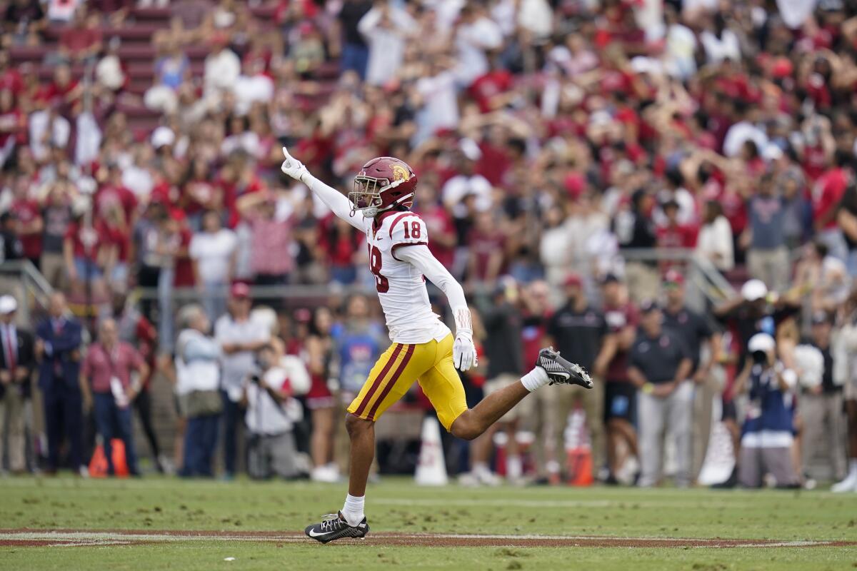 USC linebacker Eric Gentry celebrates an interception by the Trojans against Stanford on Sept. 10.