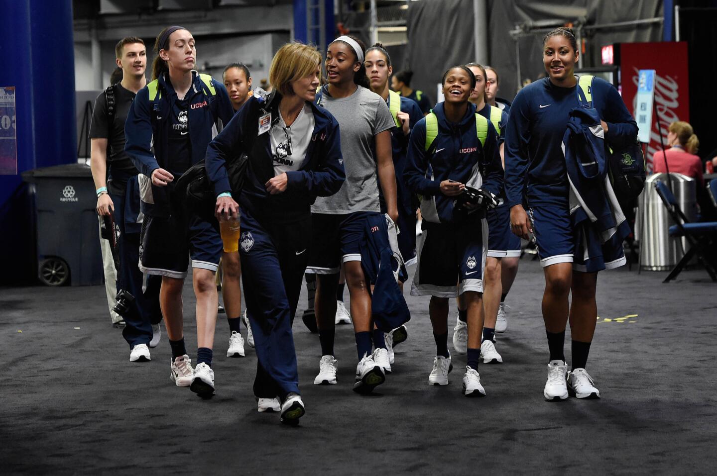 Led by associate head coach Chris Dailey, the UConn women arrive at the Amalie Arena Monday for news conference, interviews and practice. UConn will meet Notre Dame in the NCAA Championship game on Tuesday.