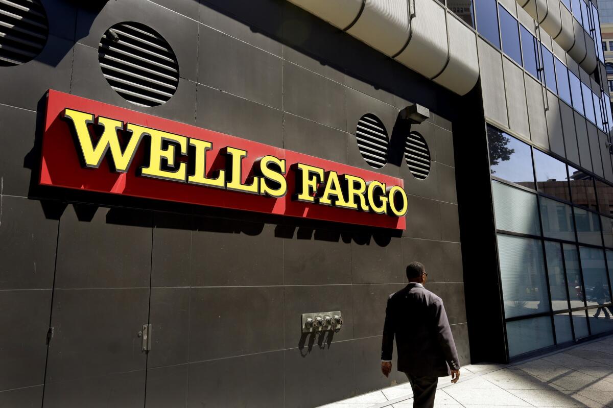 A former branch manager for a Wells Fargo in Glendale said he helped scammers access fraudulent bank accounts as part of a $14-million money laundering scheme.