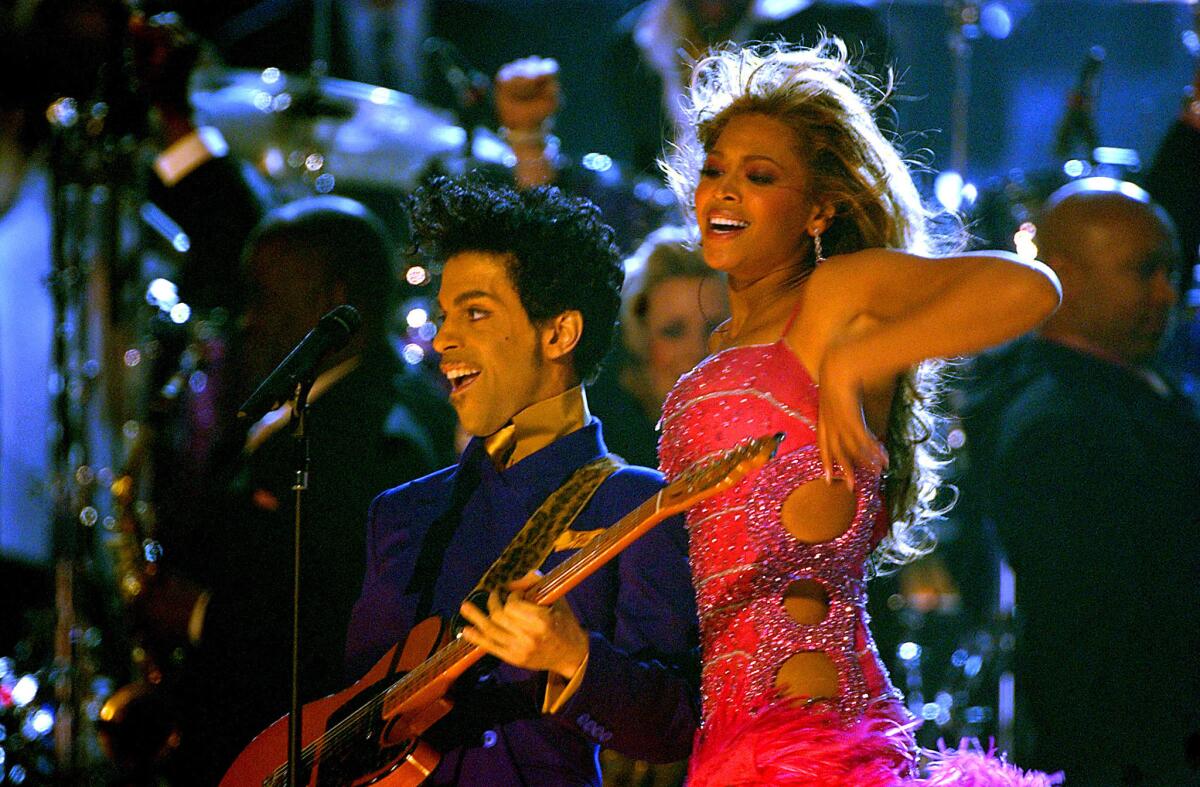 Prince and Beyoncé Knowles perform during the 46th Grammy Awards show.