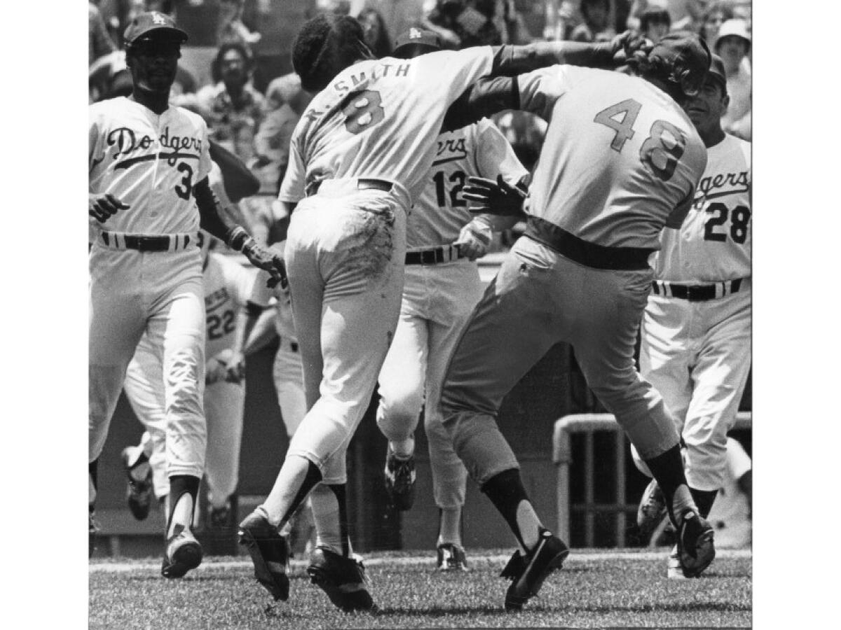 Dodger Reggie Smith lands a punch on Chicago Cubs pitcher Rick Reuschel after Reuschel hit him with a pitch at Dodger Stadium