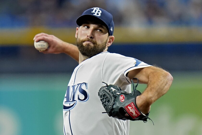 Tampa Bay Rays starting pitcher Michael Wacha goes into his windup against the Minnesota Twins during the first inning of a baseball game Friday, Sept. 3, 2021, in St. Petersburg, Fla. (AP Photo/Chris O'Meara)