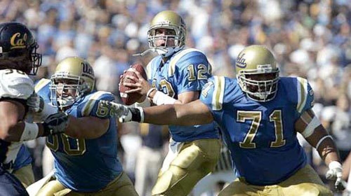 UCLA linemen Chris Joseph, left, and Shannon Tevaga provide protection for quarterback Patrick Cowan. Their ability to contain a USC defense that averages 3.3 sacks per game could be a key to the Bruins' chances on Saturday.