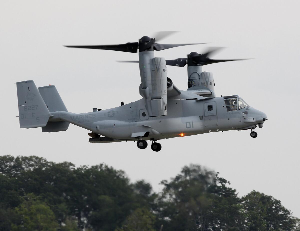 An MV-22B Osprey flies on the Marine base in Quantico, Va.