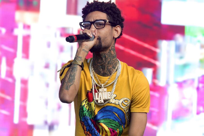 ARCHIVO - El rapero de filadelfia PnB Rock se presenta en el Festival de Música Firefly 2018 en Dover, Delaware, el 16 de junio de 2018. (Foto Owen Sweeney/Invision/AP, archivo)